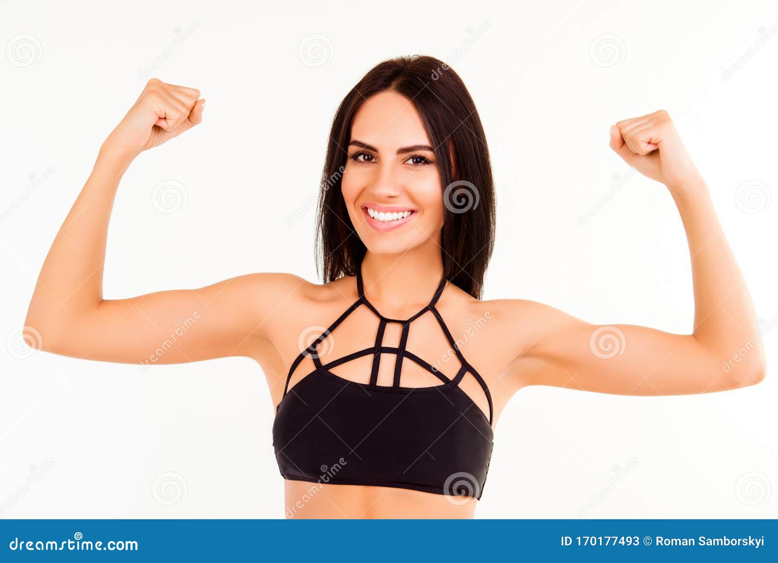 Healthy Fit Young Woman Demonstrating Her Strong Arms Stock Image