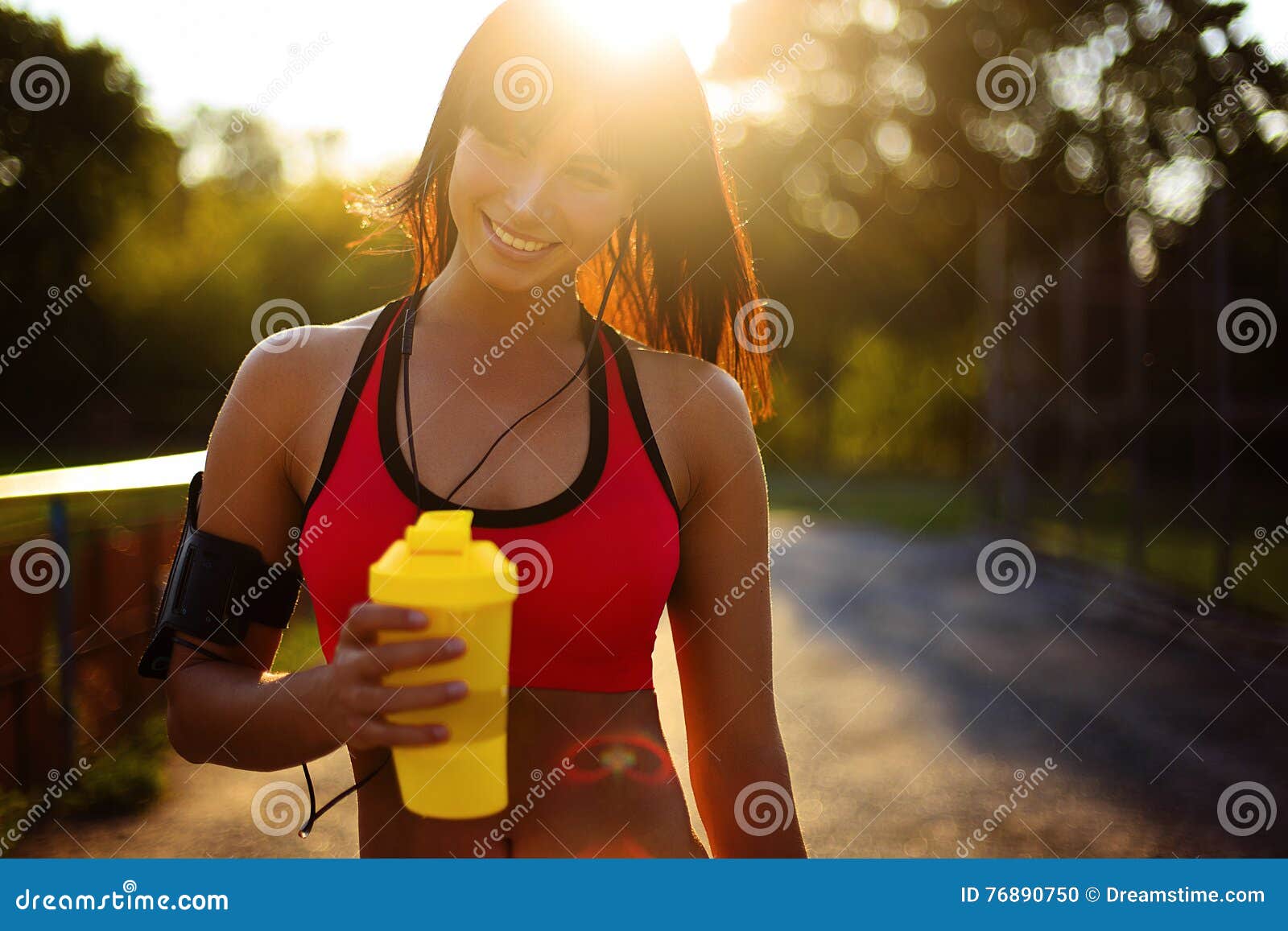 healthy fitness girl with protein shake.