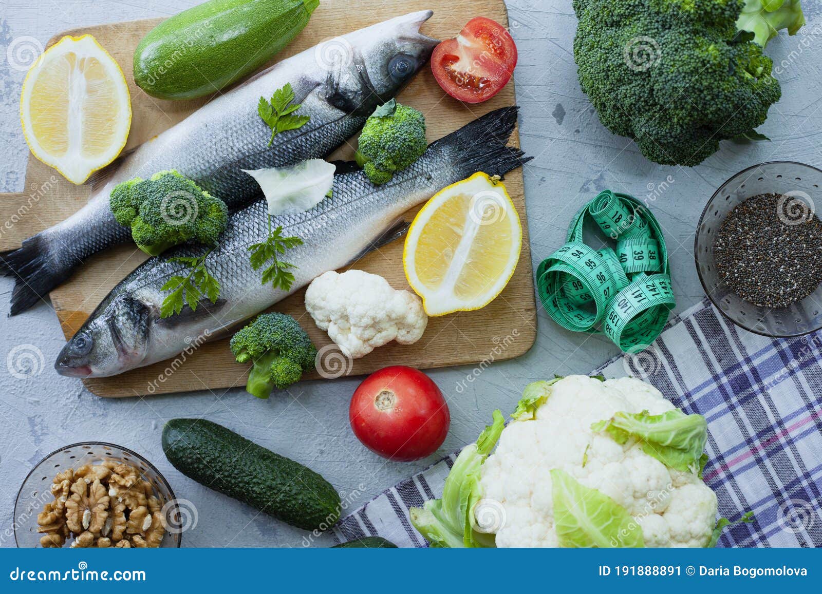 Measuring Tape, Fresh Raw Fish Sea Bass on Cutting Board, Raw Vegetables,  Spices and Nuts. Stock Image - Image of kitchen, ingredient: 191888891