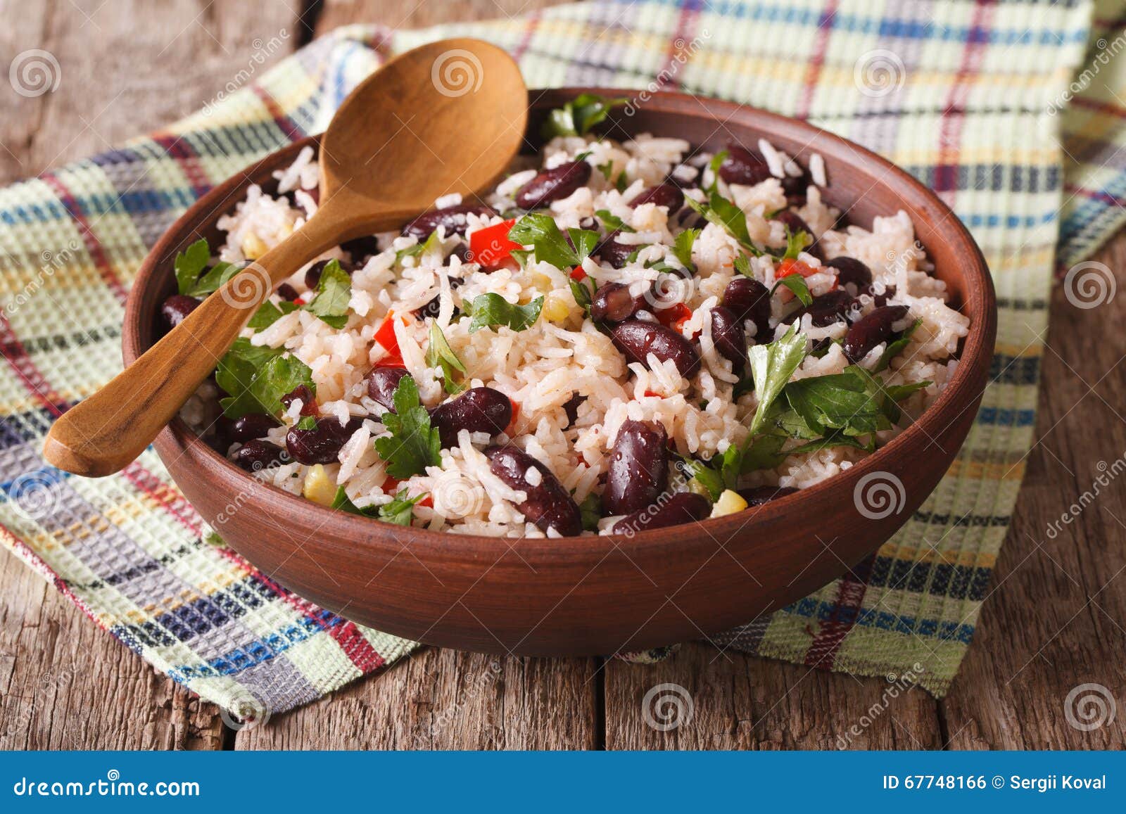 healthy food: rice with red beans in a bowl close-up. horizontal