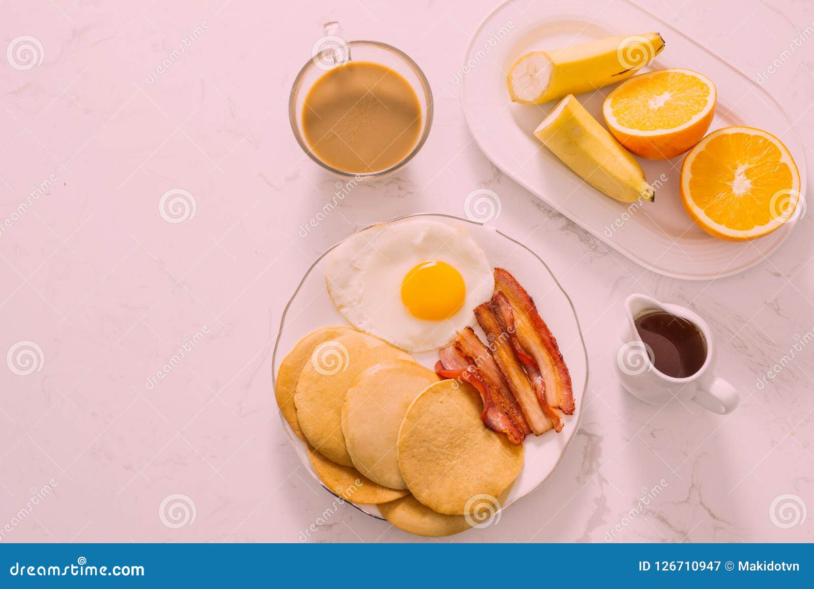 Healthy Full American Breakfast with Eggs Bacon and Pancakes Stock
