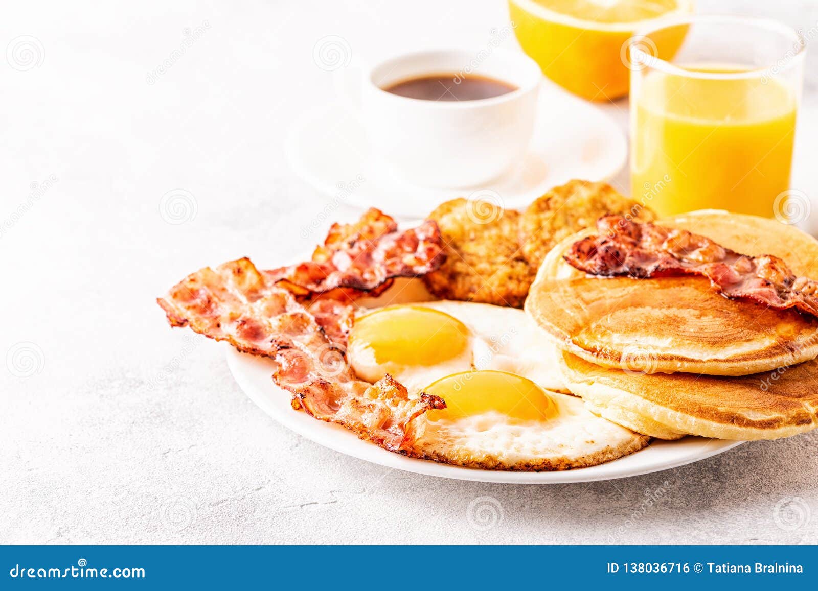 Healthy Full American Breakfast with Eggs Bacon Pancakes and Latkes ...