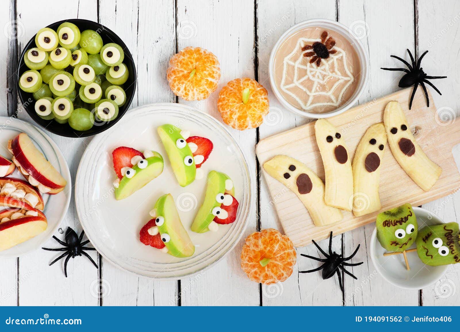 Healthy Halloween  Fruit  Snack  Table Scene Over A White 