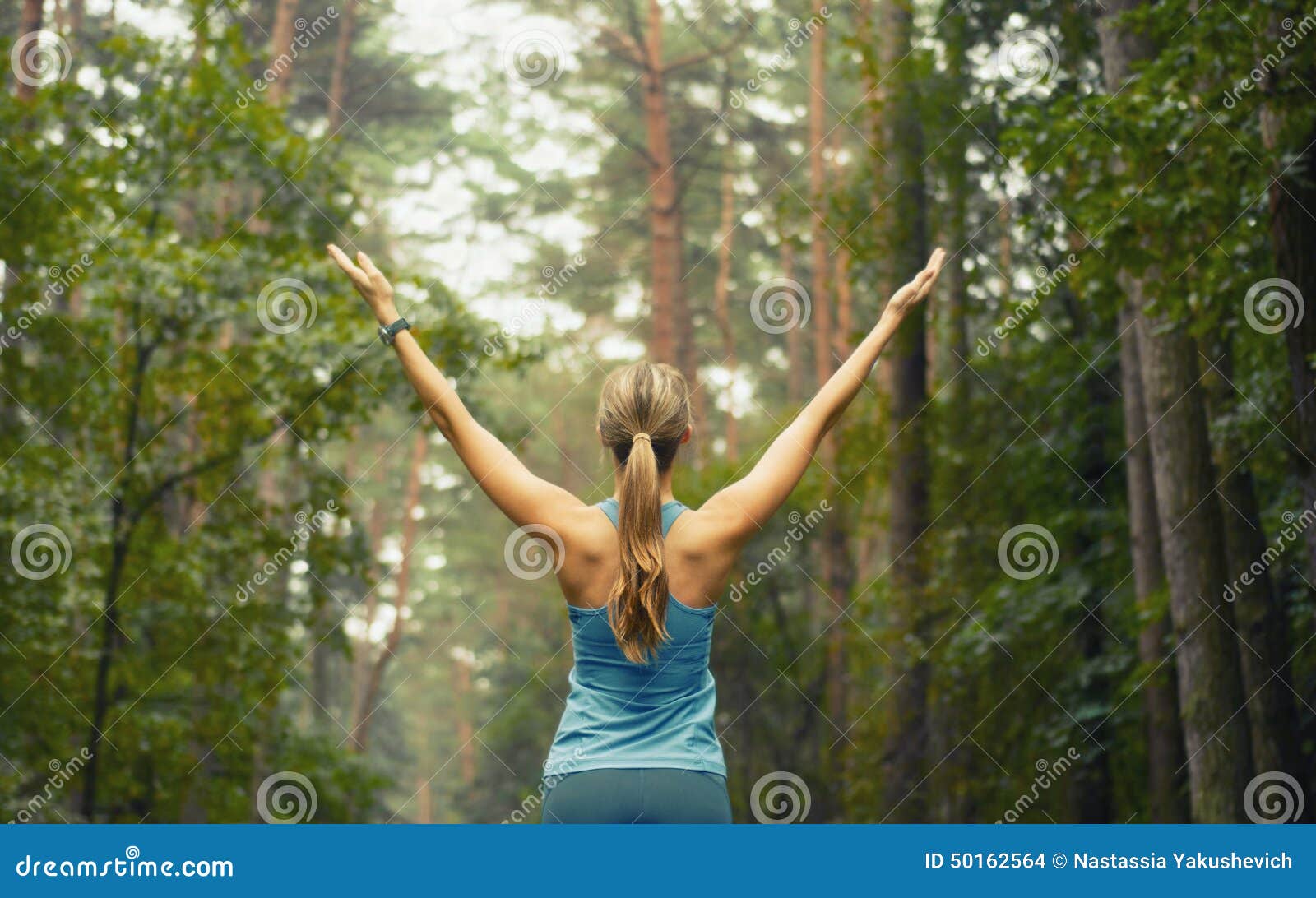healthy lifestyle fitness sporty woman early in forest area
