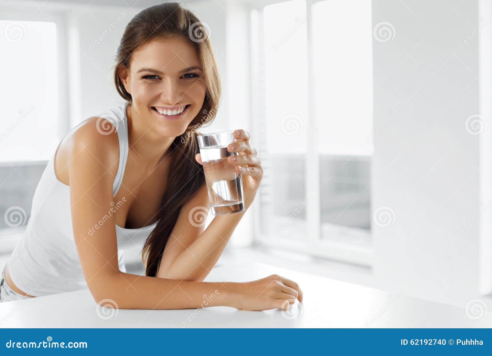 healthy lifestyle. happy woman with glass of water. drinks. heal