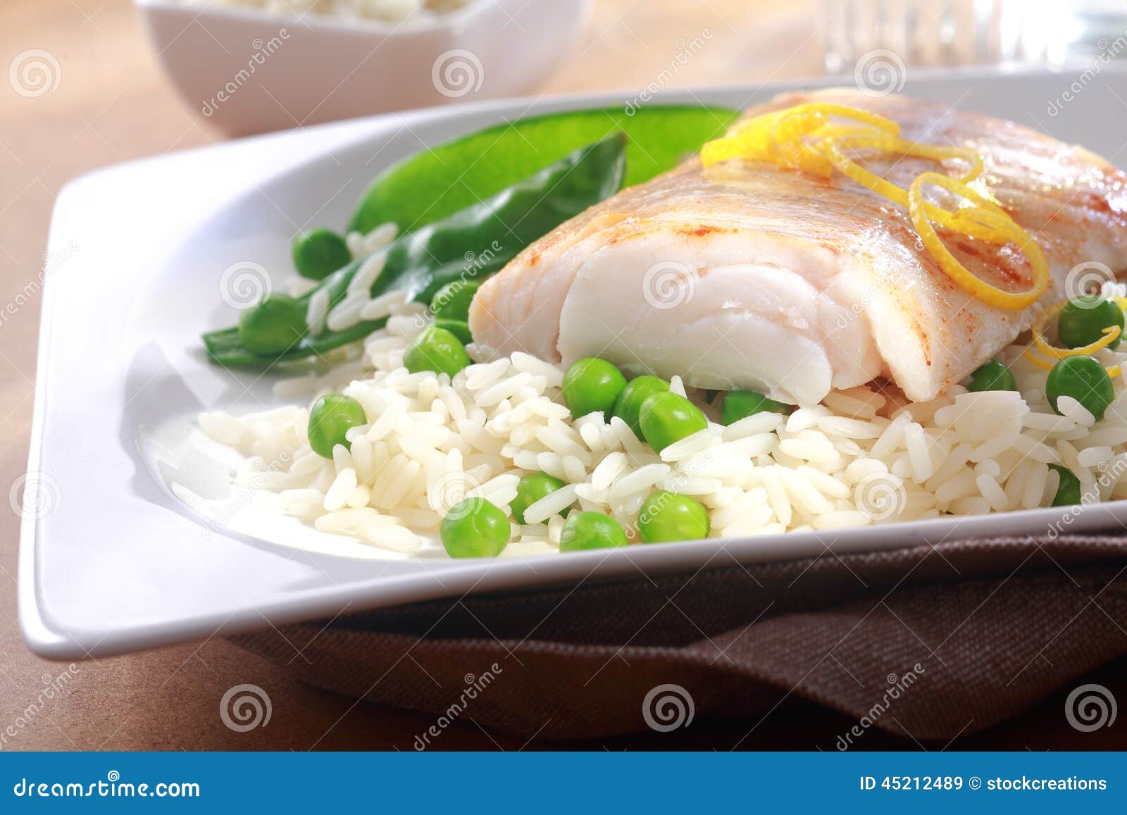 Healthy Meal of Baked Fish, Rice and Peas Stock Image - Image of fish