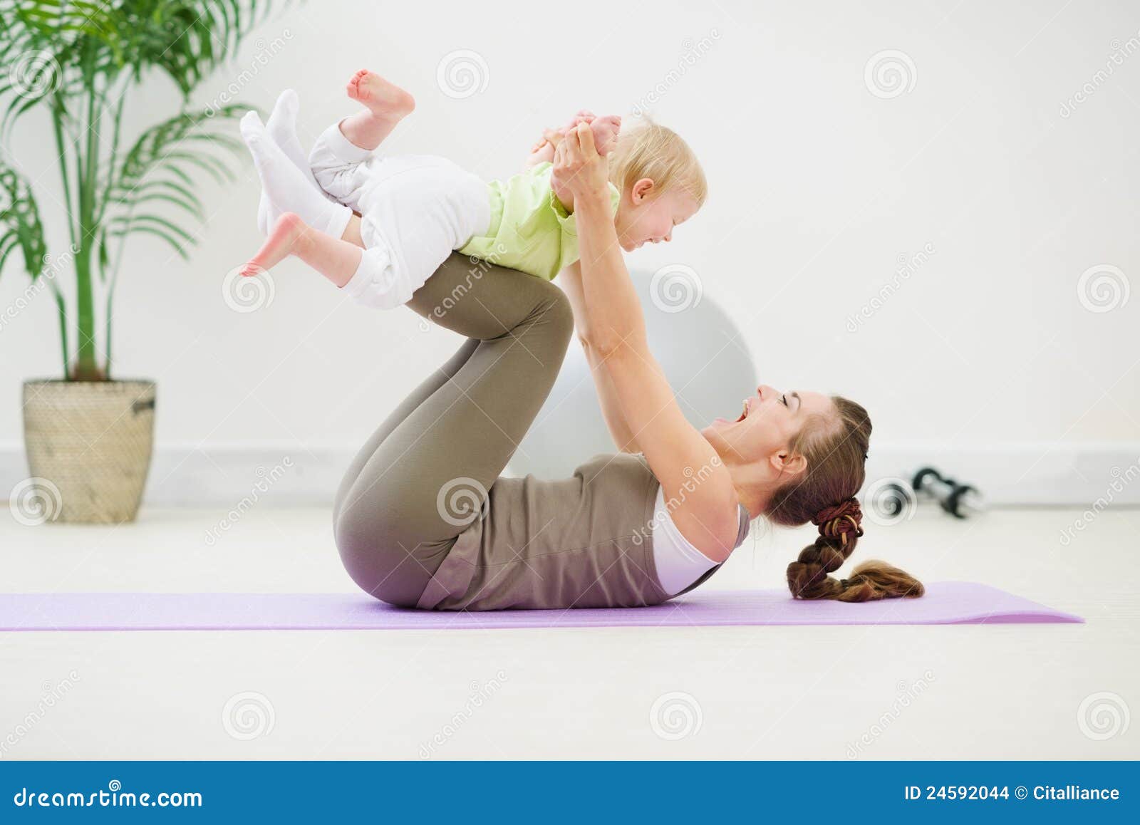 Healthy Mother and Baby Making Gymnastics Stock Photo Image of