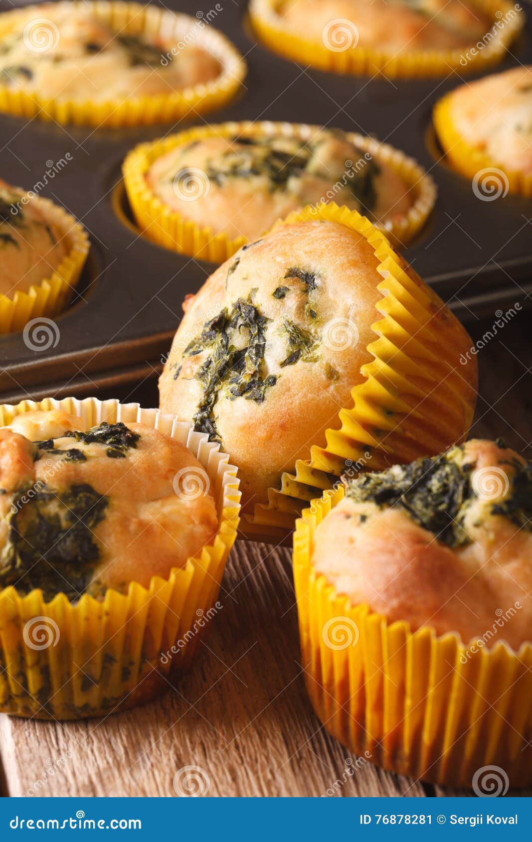 Healthy Muffins with Spinach and Feta Cheese Macro. Vertical Stock