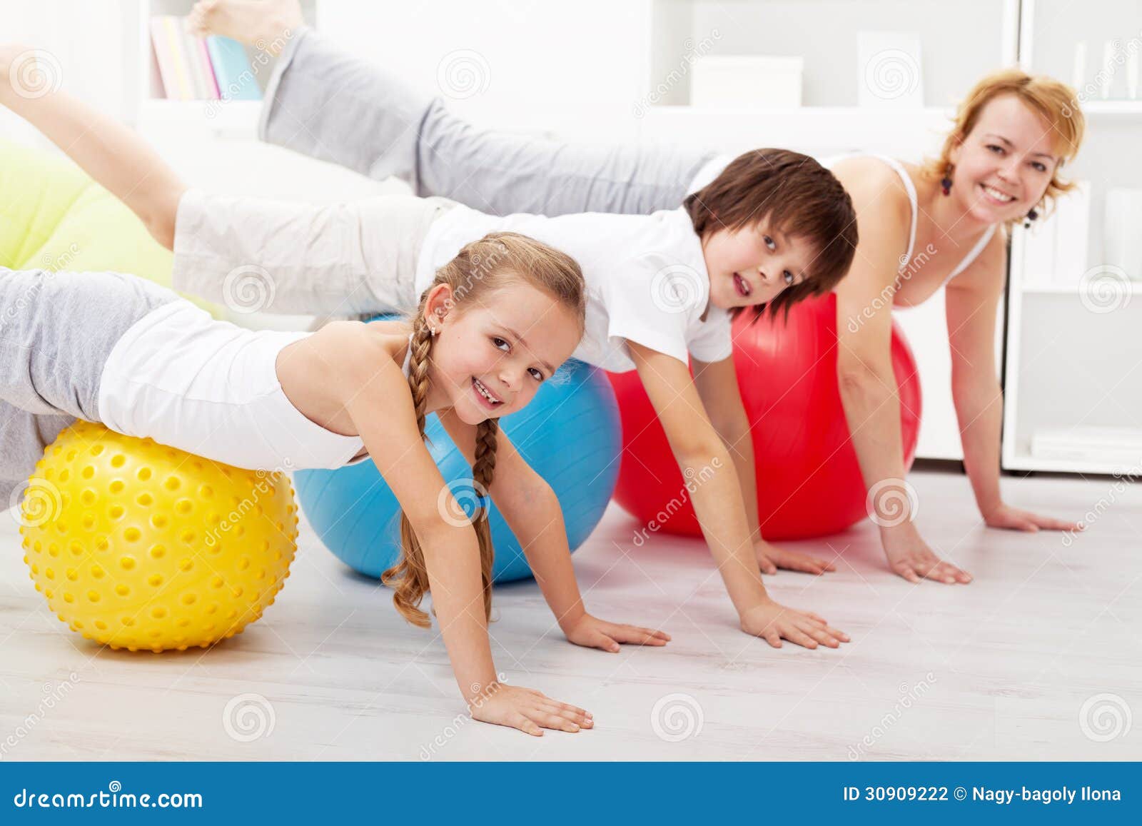 healthy people doing balancing exercise at home