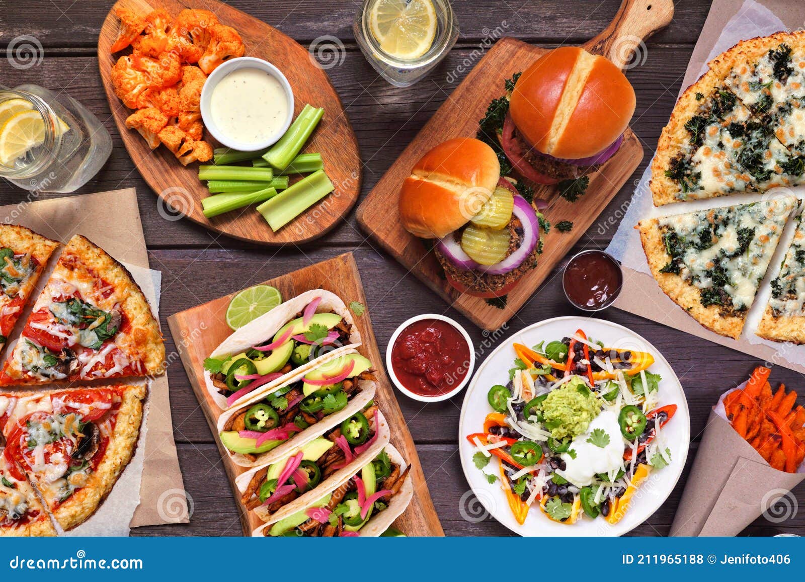 healthy plant based fast food table scene. overhead view on a wood background.