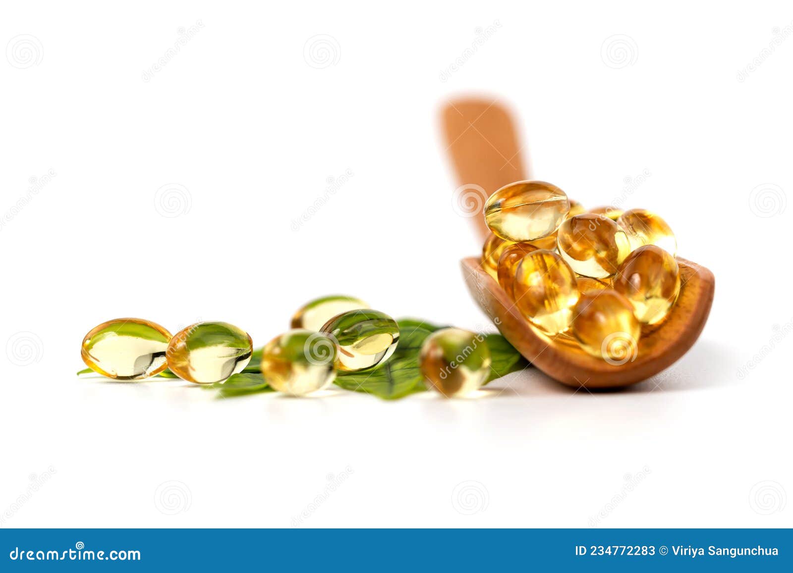 Vitamins And Omega 3 Fish Oil On The Natural Background Royalty Free vitamins-and-omega-3-fish-oil-on-the-natural-background-royalty-free