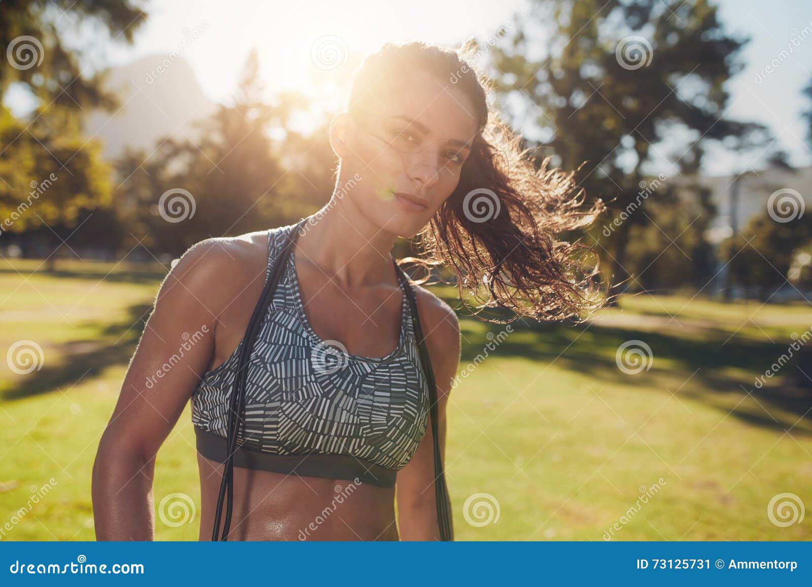Healthy Young Woman at the Park with a Skipping Rope Stock Image