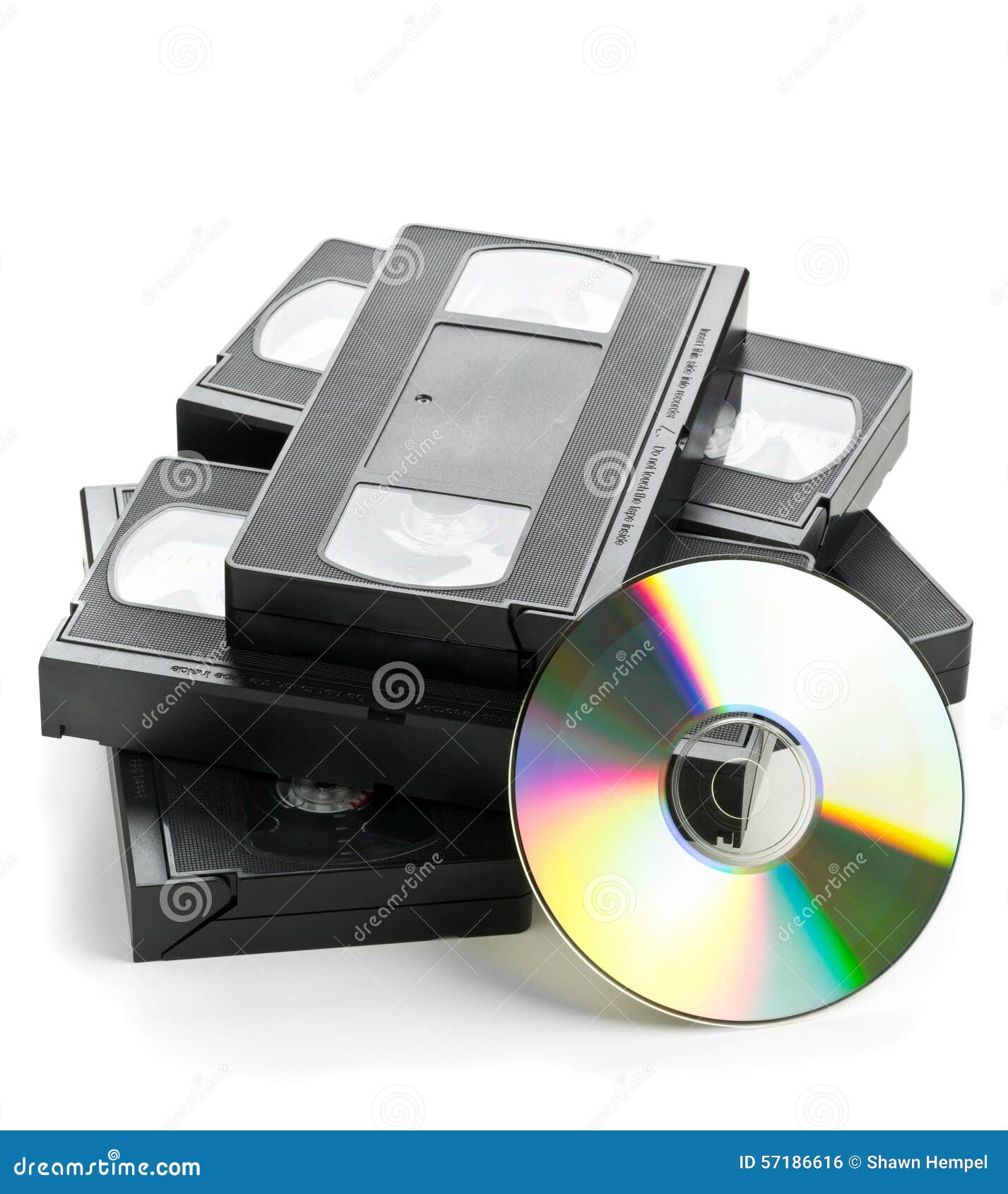 Heap Of Analog Video Cassettes With DVD Disc Stock Photo 