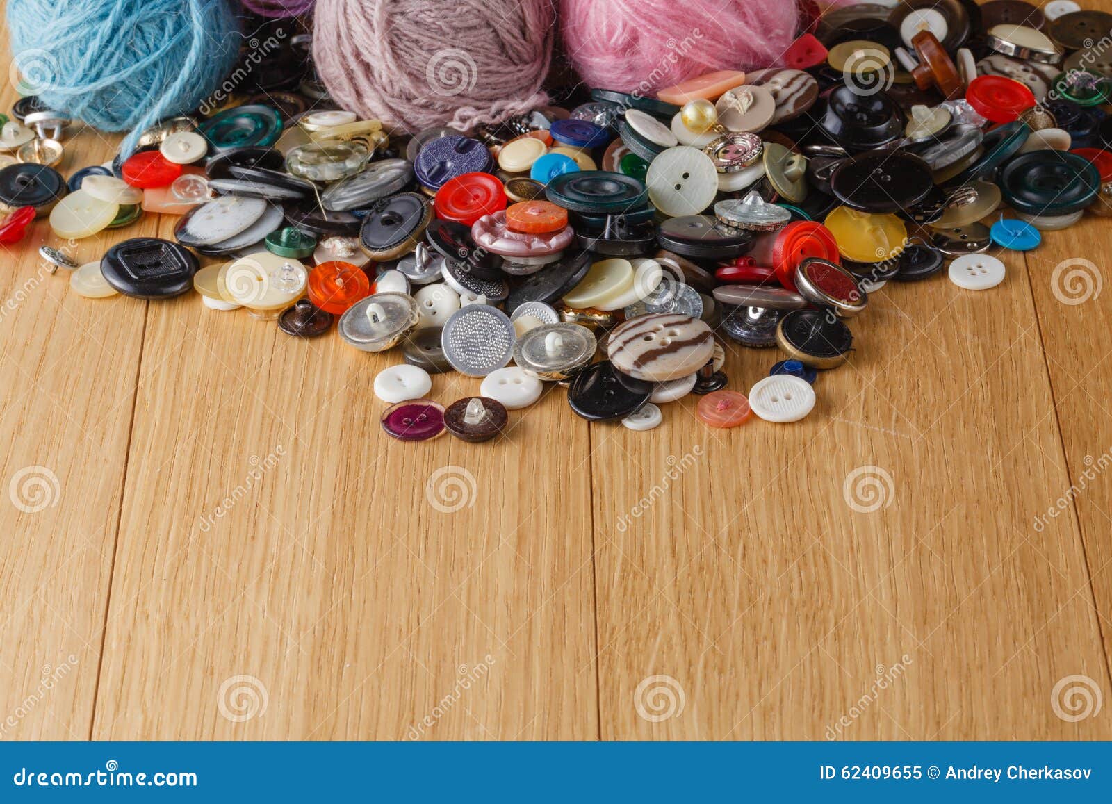 heap of button on wood table