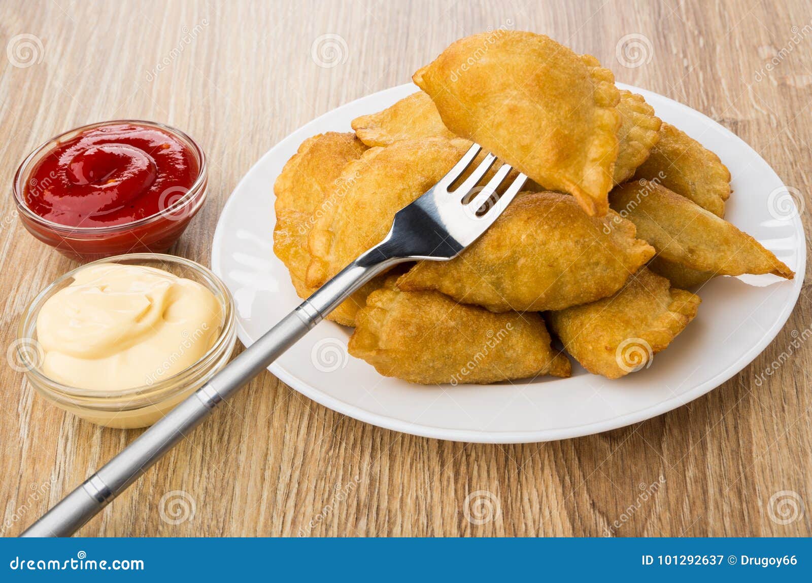 Chebureks in Plate, Bowls with Ketchup and Mayonnaise, Fork Stock Image ...