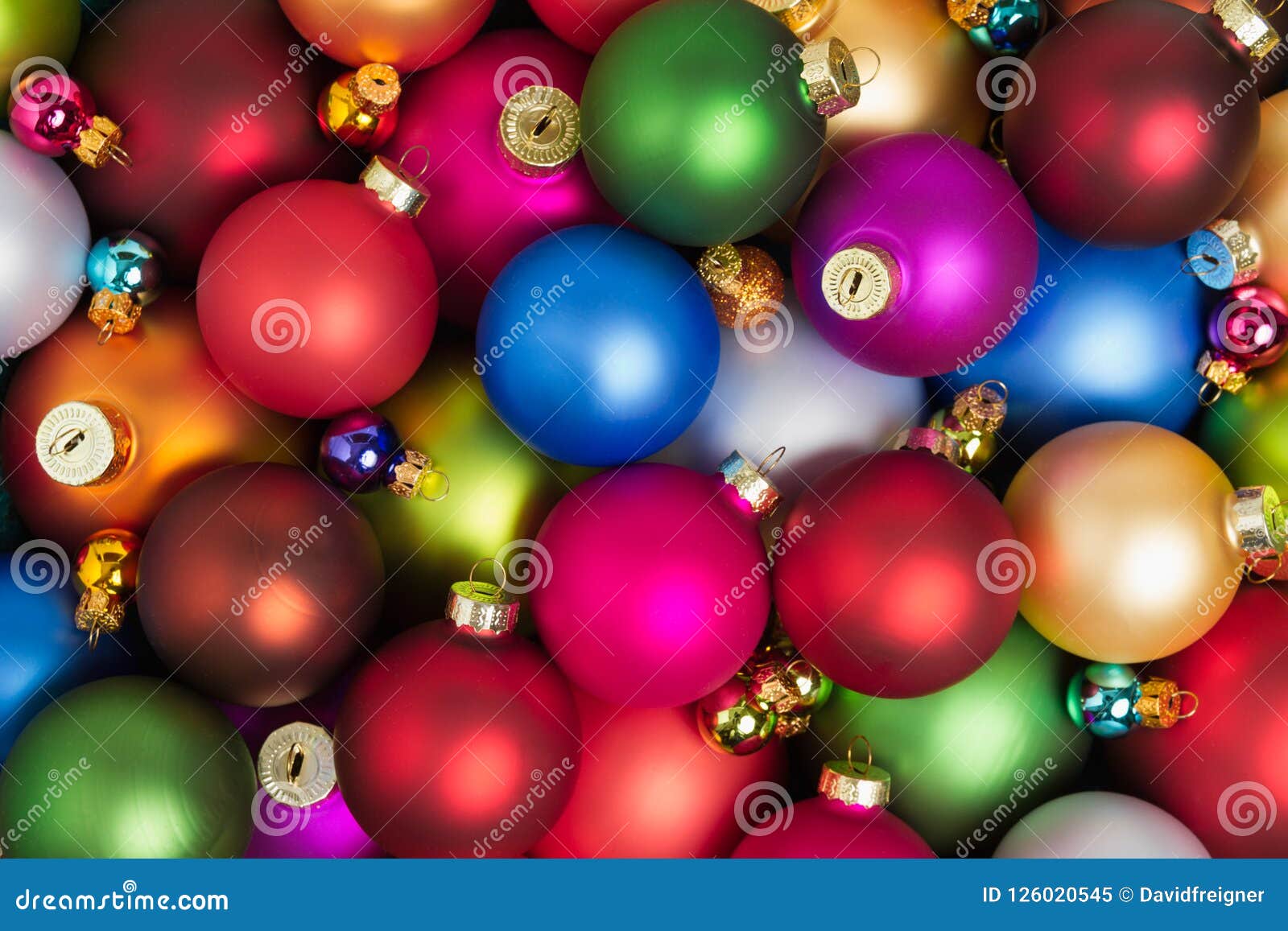 A Heap Of Colorful Christmas Baubles Lying On The Floor Stock Image