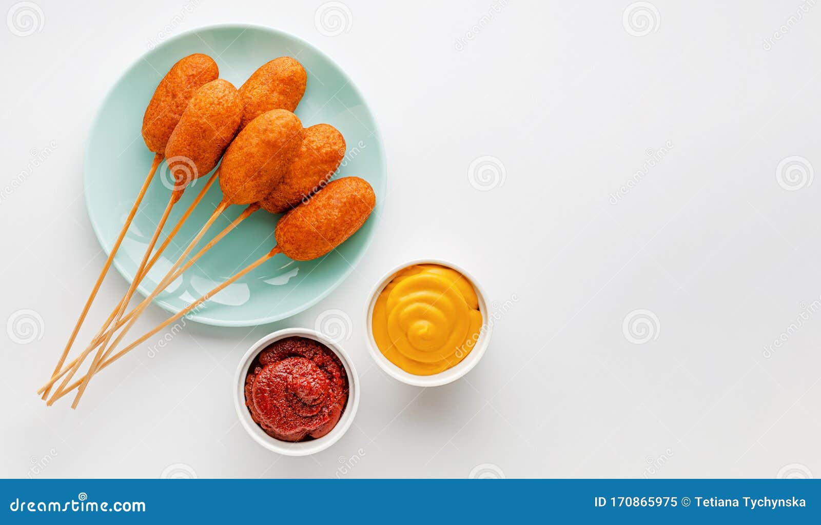 Heap of Deep Fried Corn Dogs on White Background. Top View Stock Image