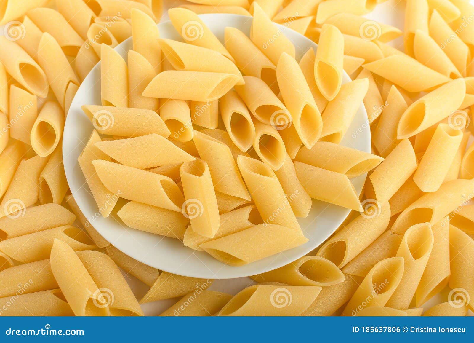 Heap of Dried Mezze Penne Rigate Italian Pasta Ready To Be Cooked, on a  White Table, Top View or Flat Lay of Healthy Food Stock Photo - Image of  lunch, ingredient: 185637806