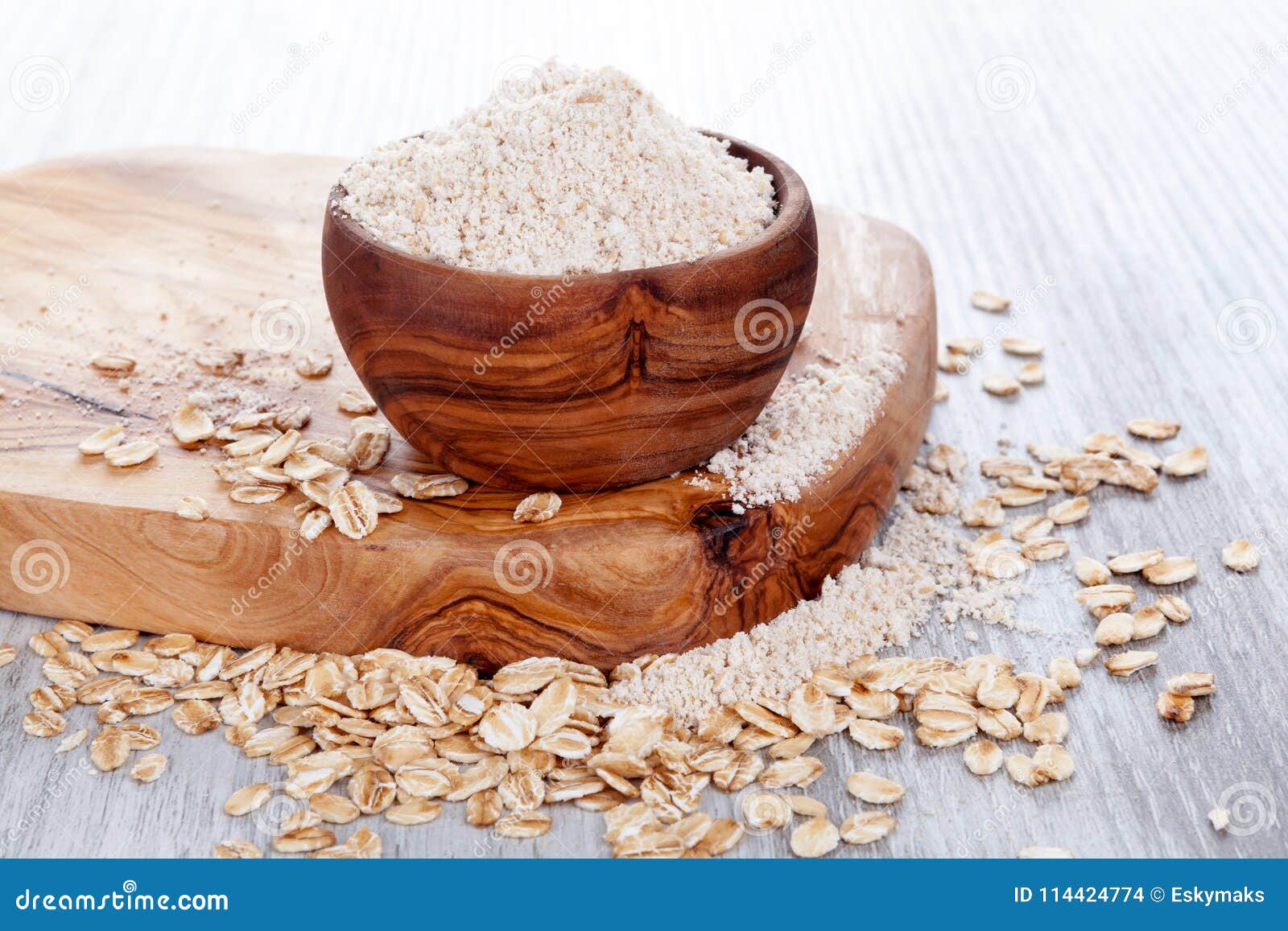 Oat flour in wooden bowl. stock photo. Image of pile - 114424774