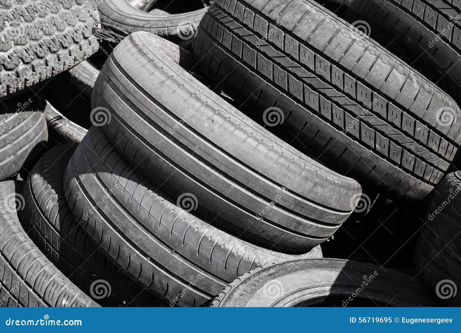 Heap of Used Worn-out Automotive Tires Stock Image