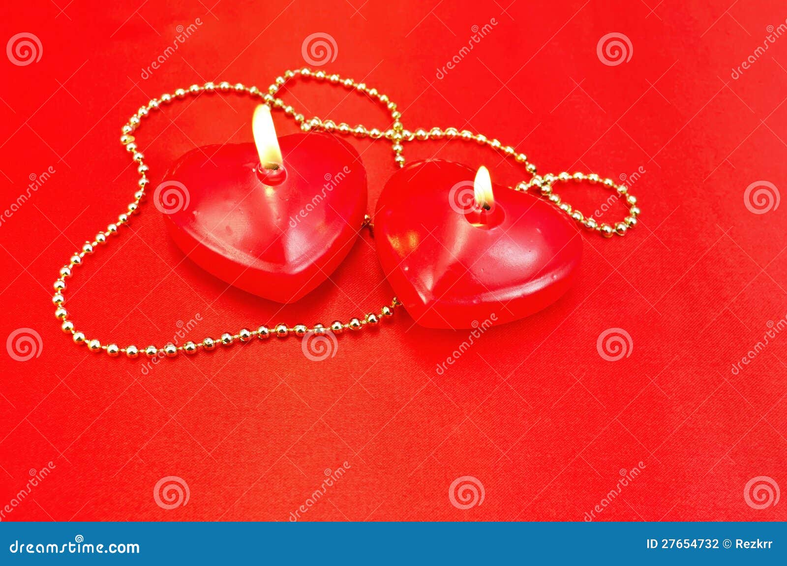 Heart of a Candle with a Necklace on a Red Silk Stock Photo Image of