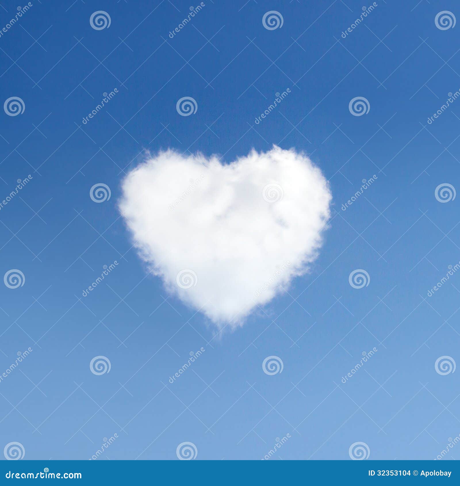 Heart of Clouds Symbol of Love on Background of Blue Sky Stock