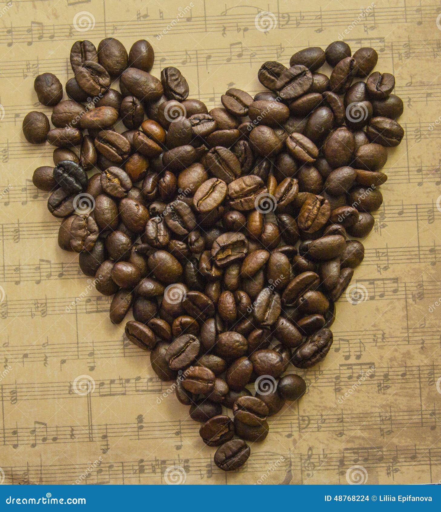 Heart Of Coffee Beans On The Background Music Sheet Stock Photo Image