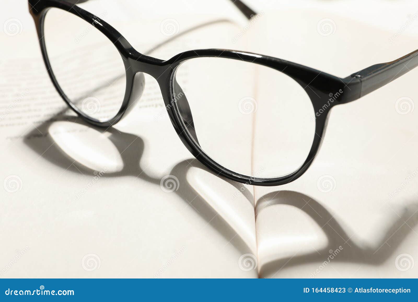 Heart Made of Shadow and Glasses on Opened Book Stock Image Image of