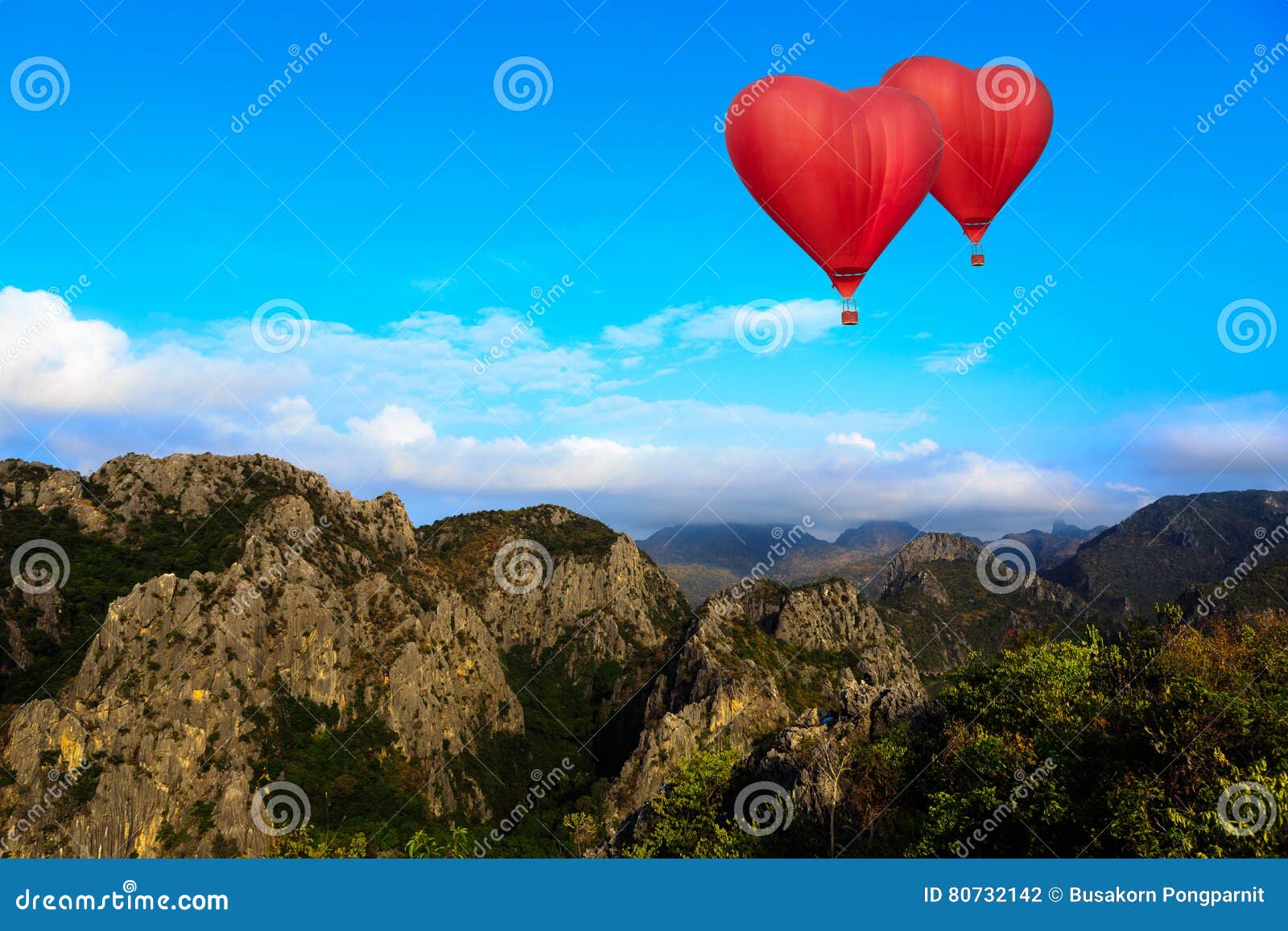 heart  ballooning flying over mountain
