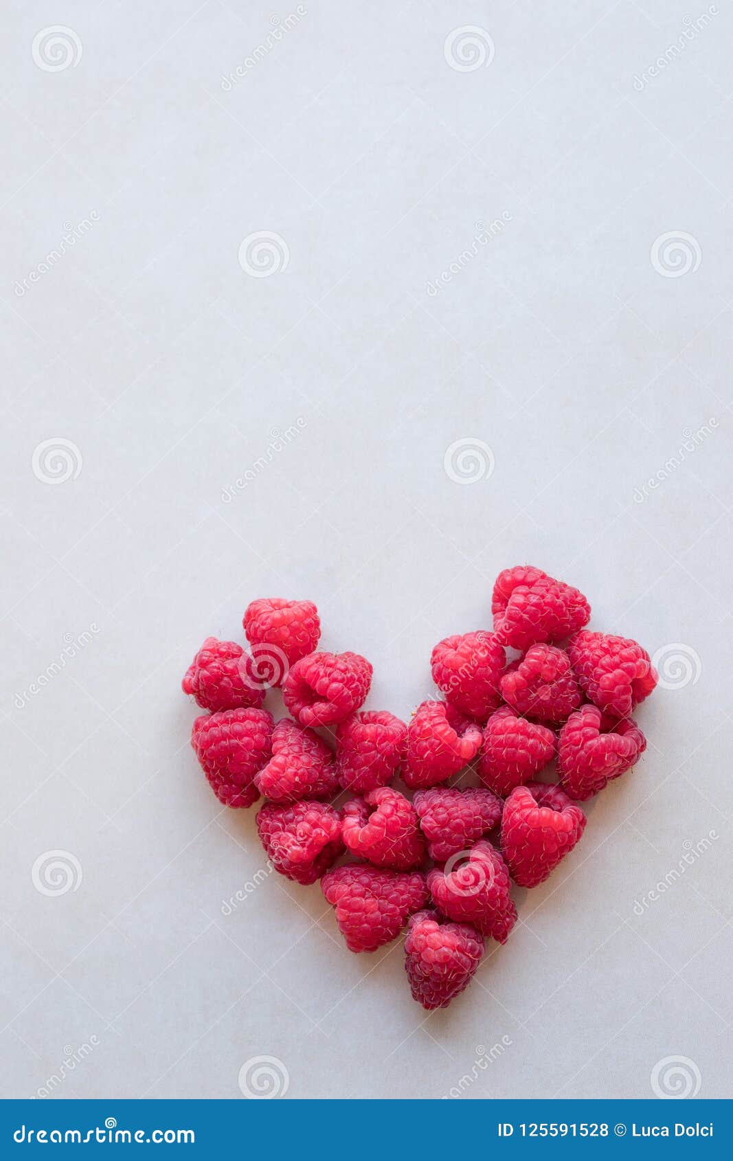 Heart shaped raspberries stock photo. Image of heart 125591528