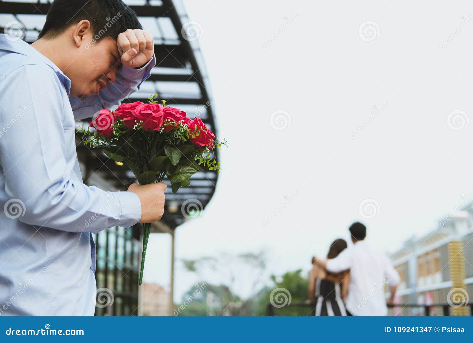 Heartbroken Man Holding Bouquet of Red Roses Feeling Sad while S ...