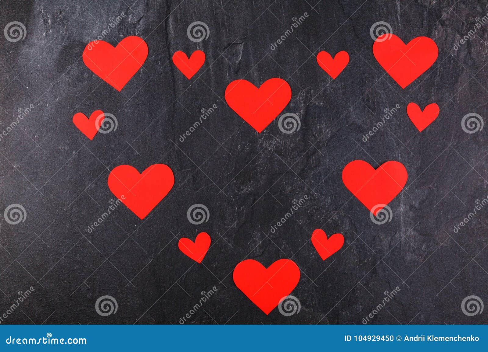 hearts are lined in one big heart on a stone background