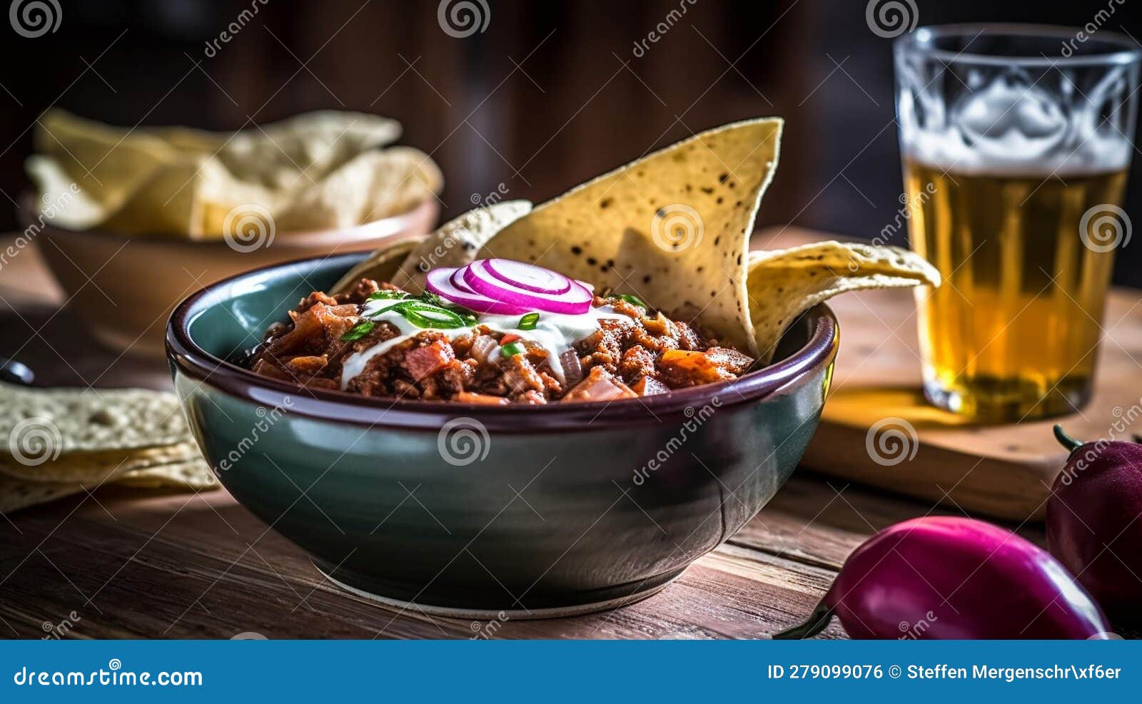 hearty chili con carne in rustic crockpot with toppings