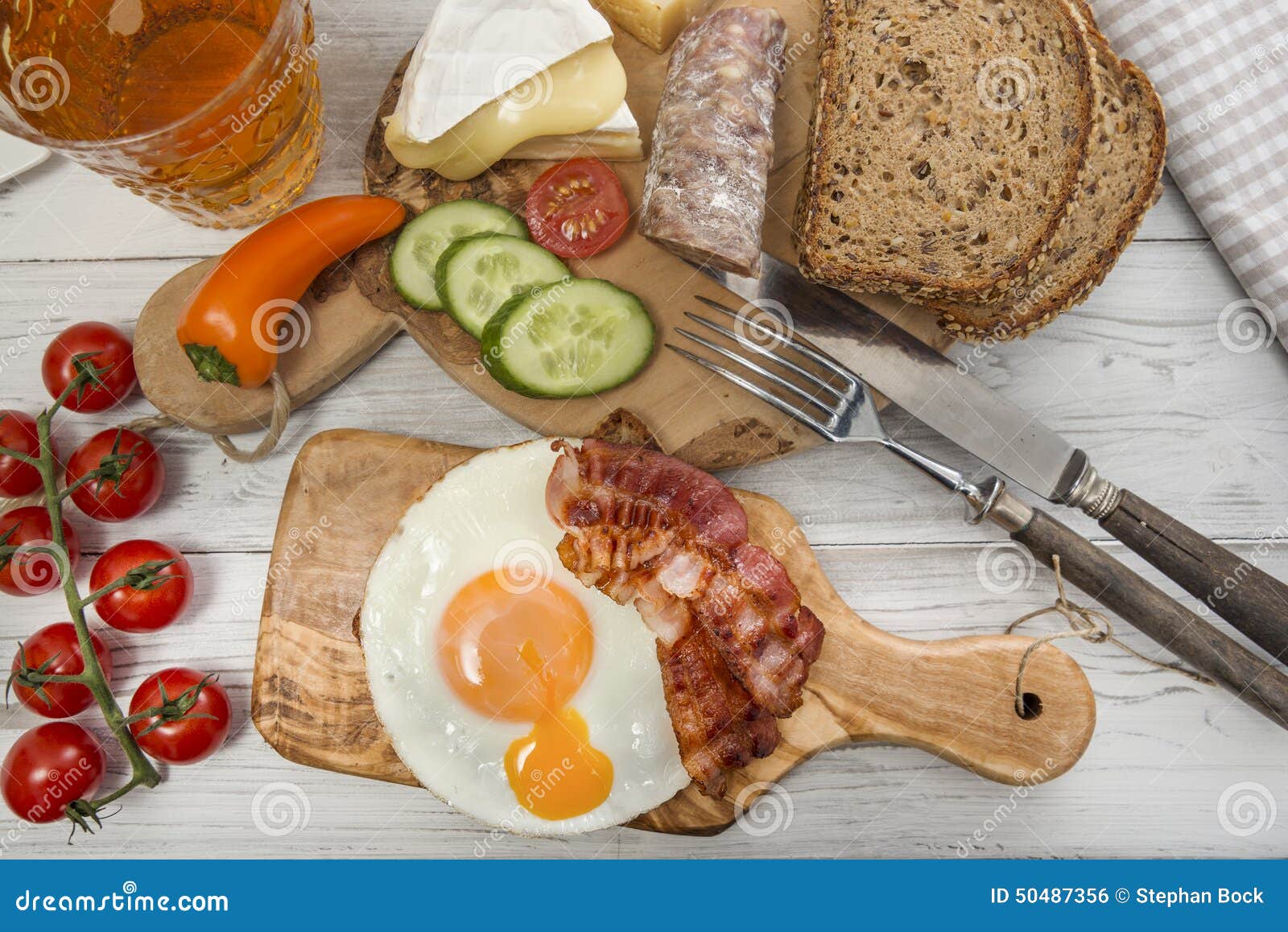 Hearty Supper, Fried Egg and Bacon on Protein Bread Stock Photo Image