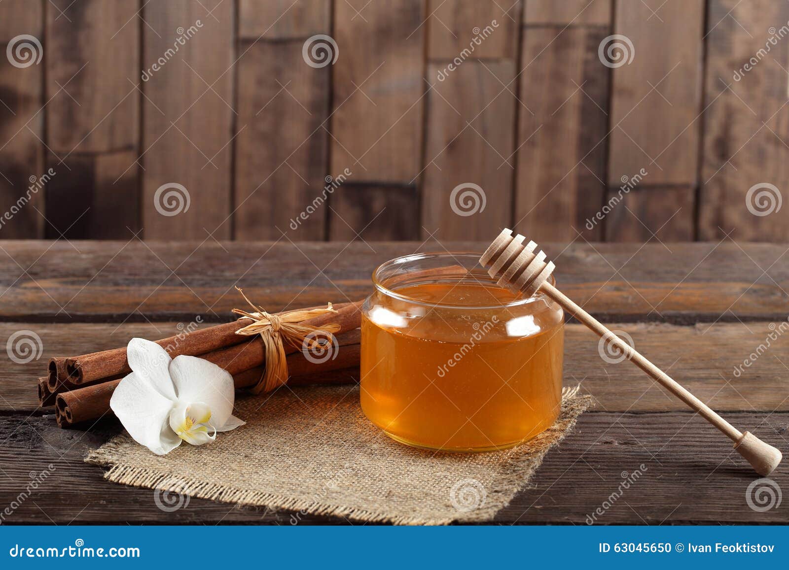 heather honey and cinnamon on wooden table