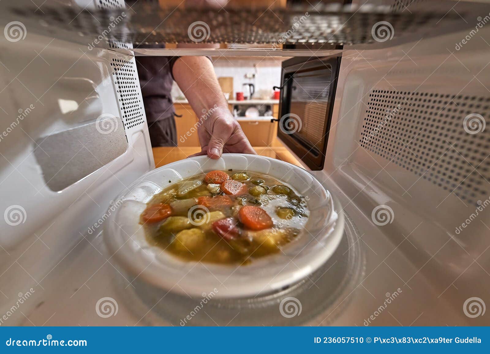 Heating Food in a Microwave Oven Stock Photo - Image of kitchen, door:  236057510