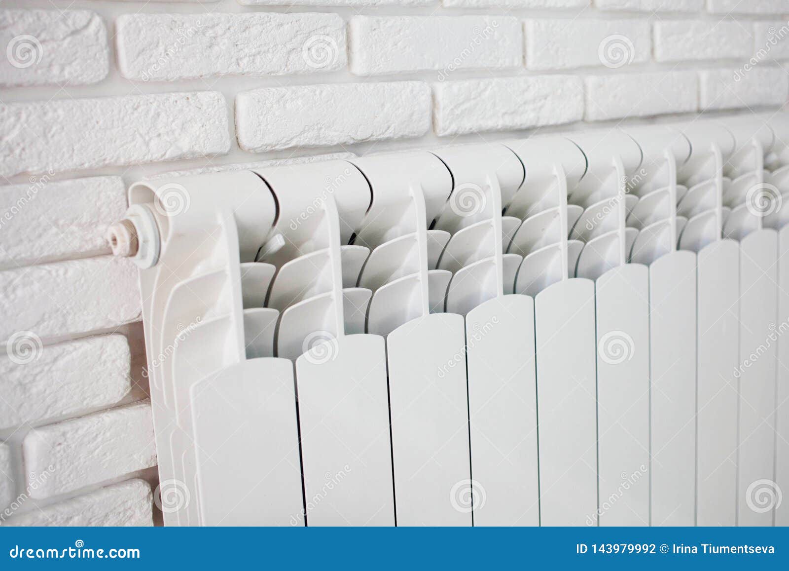 A Heating Radiator on the Brick Plaster Wall Stock Photo Image of