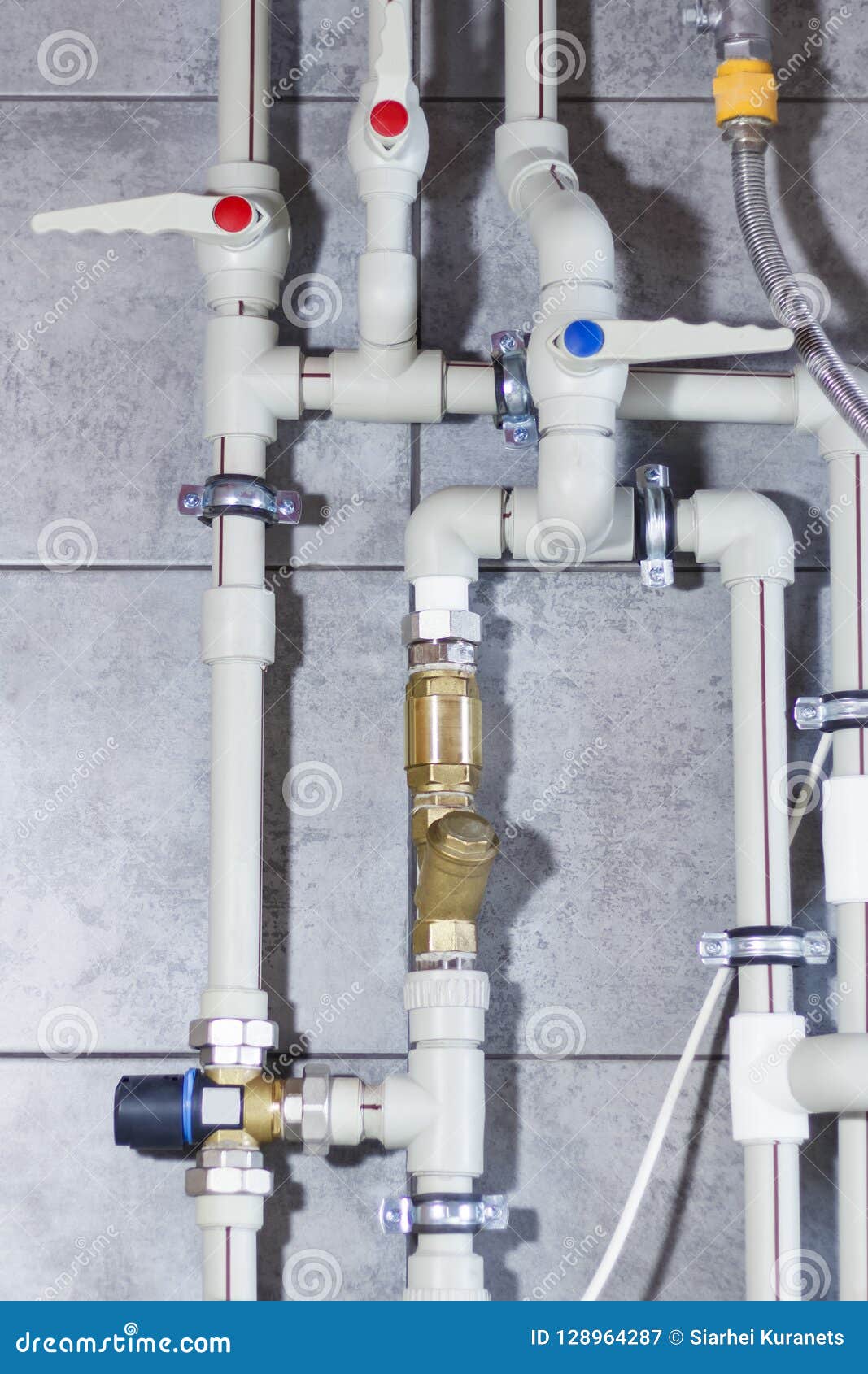 Heating System with Plastic Pipes, Valves and Other Equipment in the