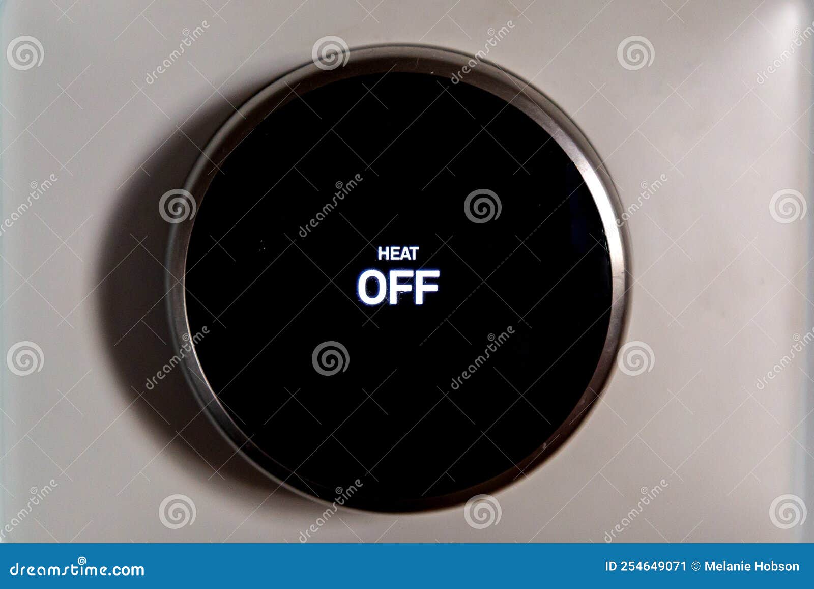 A Heating Thermostat Mounted on the Wall and Switched Off Stock Image