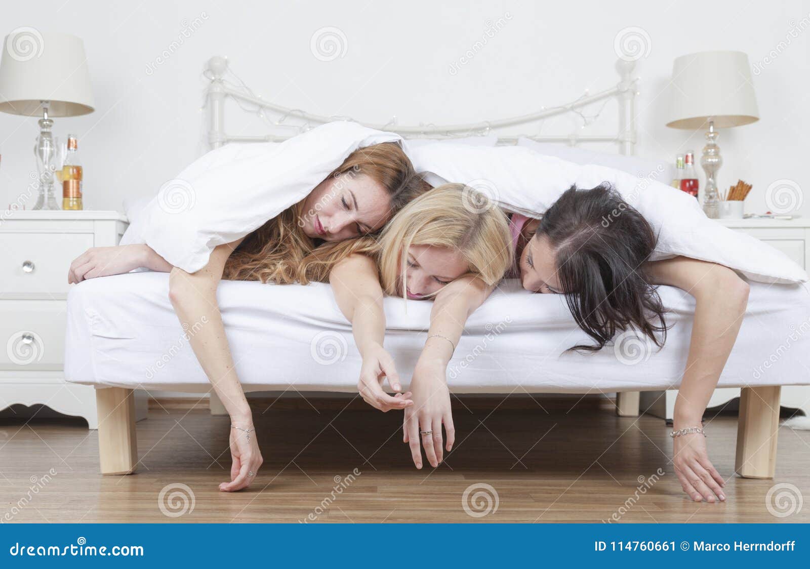 heavily drunk women sleep in bed