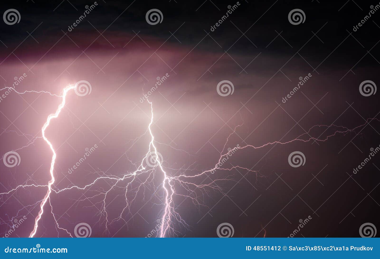 Heavy Clouds Bringing Thunder Lightnings and Storm Stock Photo Image