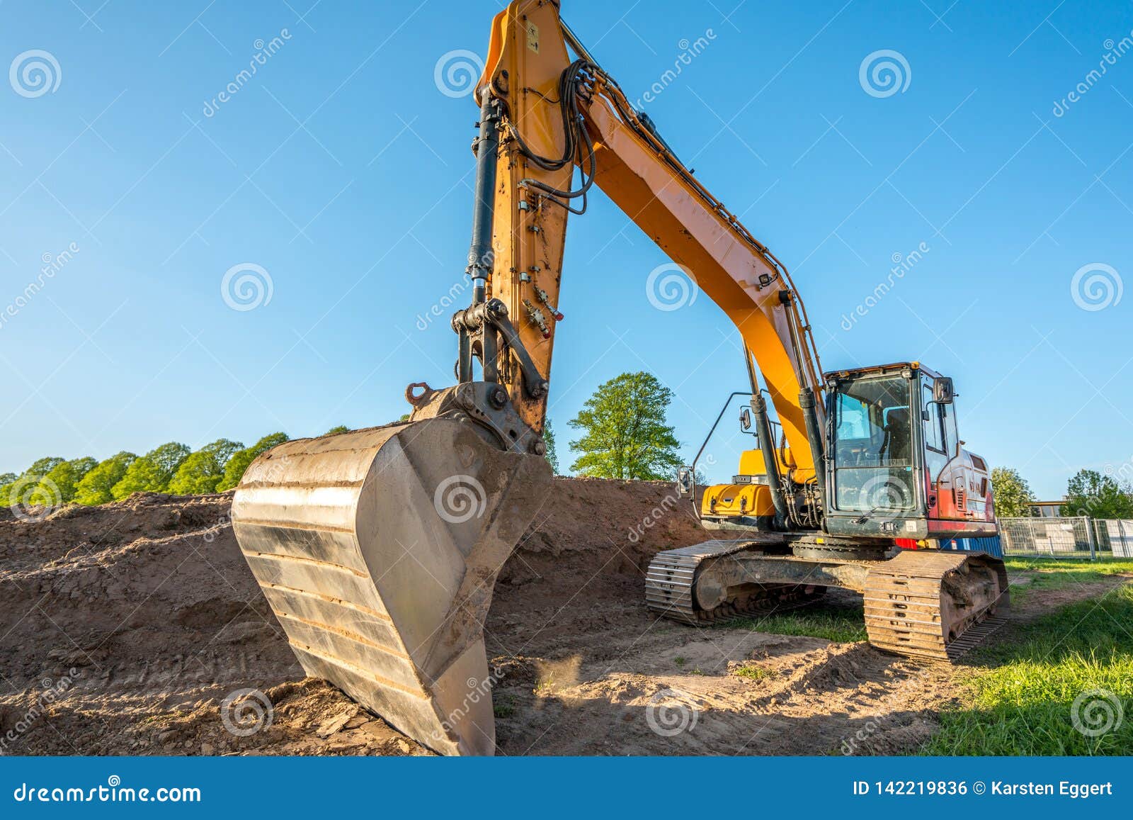 Heavy Construction Machinery Performs Work on a Construction Site Stock