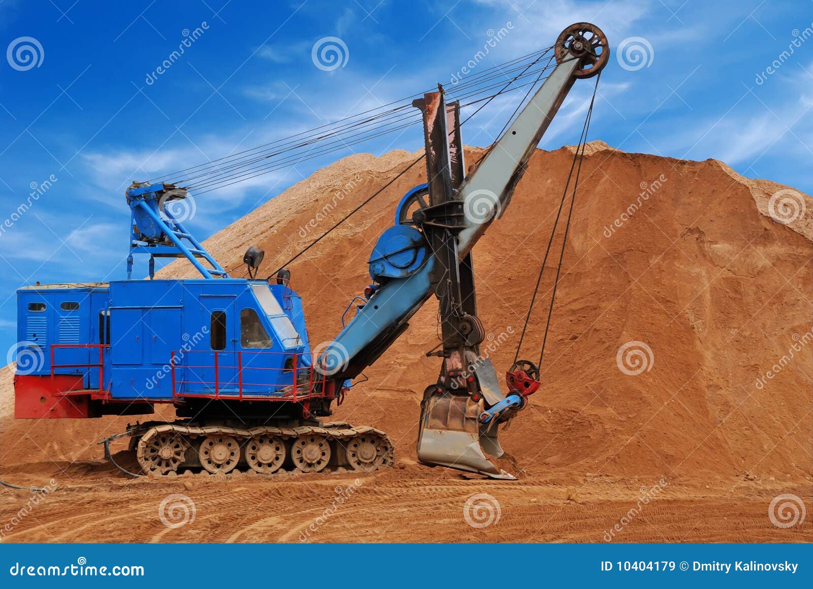 heavy electric excavator in sandpit