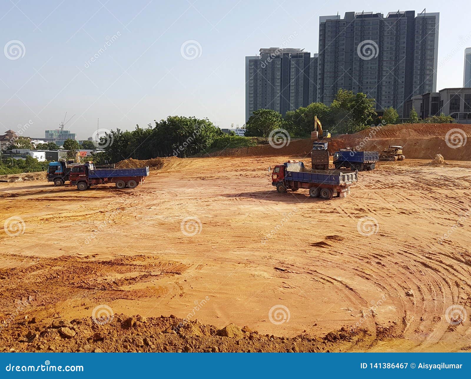 Heavy Machinery Doing The Earthwork Site Clearing At The ...