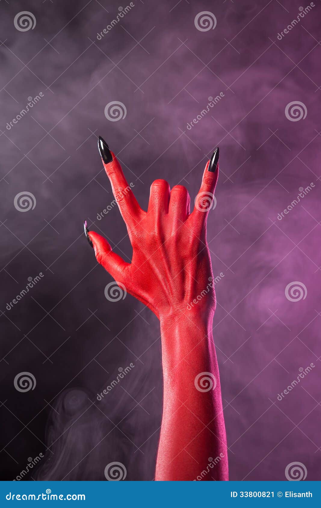 Heavy Metal Gesture, Red Devil Hand With Black Nails Stock Image