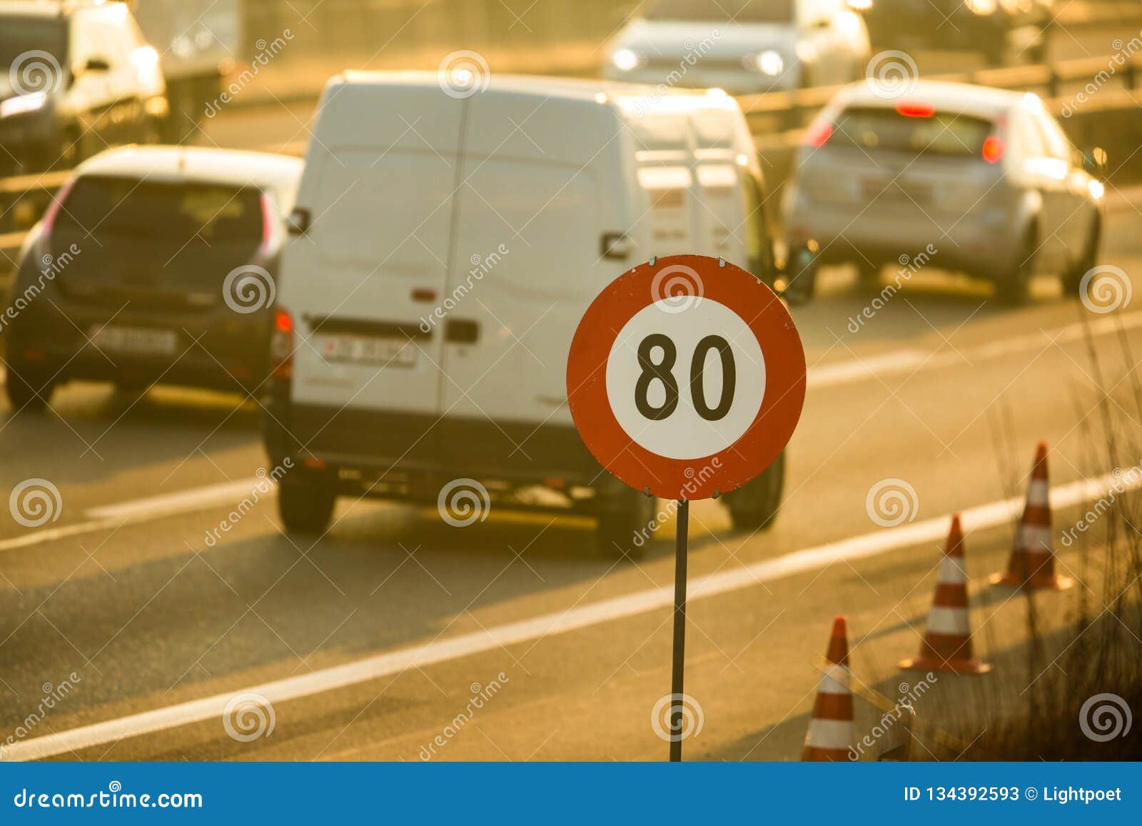 cars going very slowly in a traffic jam during the morning rushhour