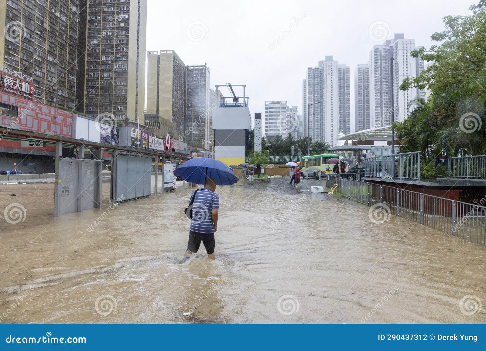 After Heavy Rain in Hong Kong, Citizens Walk in Muddy Water on the ...