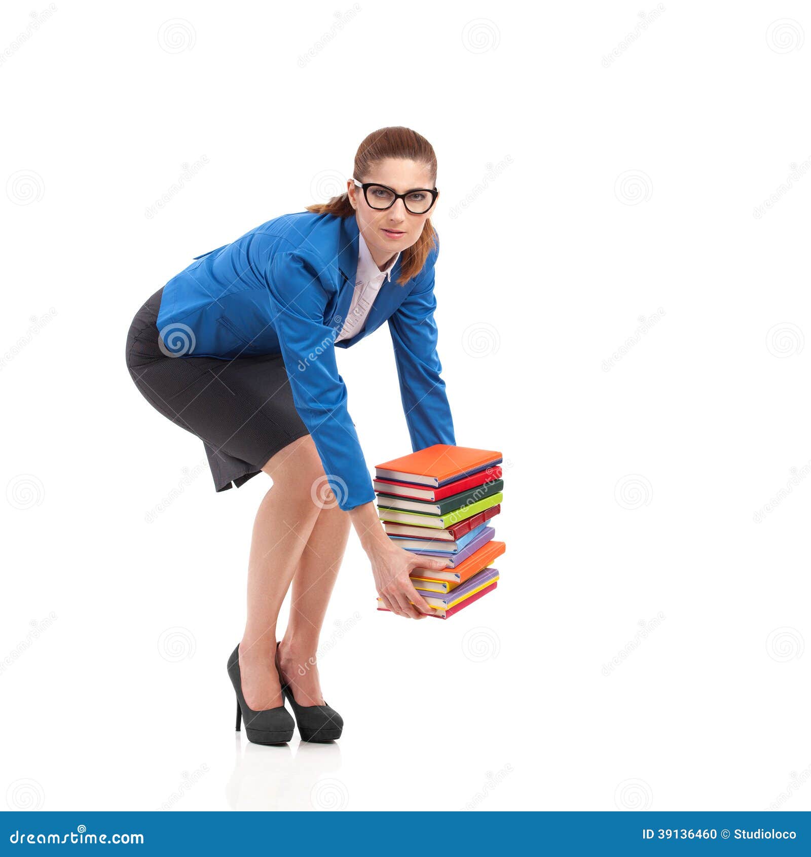 Heavy stack of books stock photo. Image of brown, camera 39136460