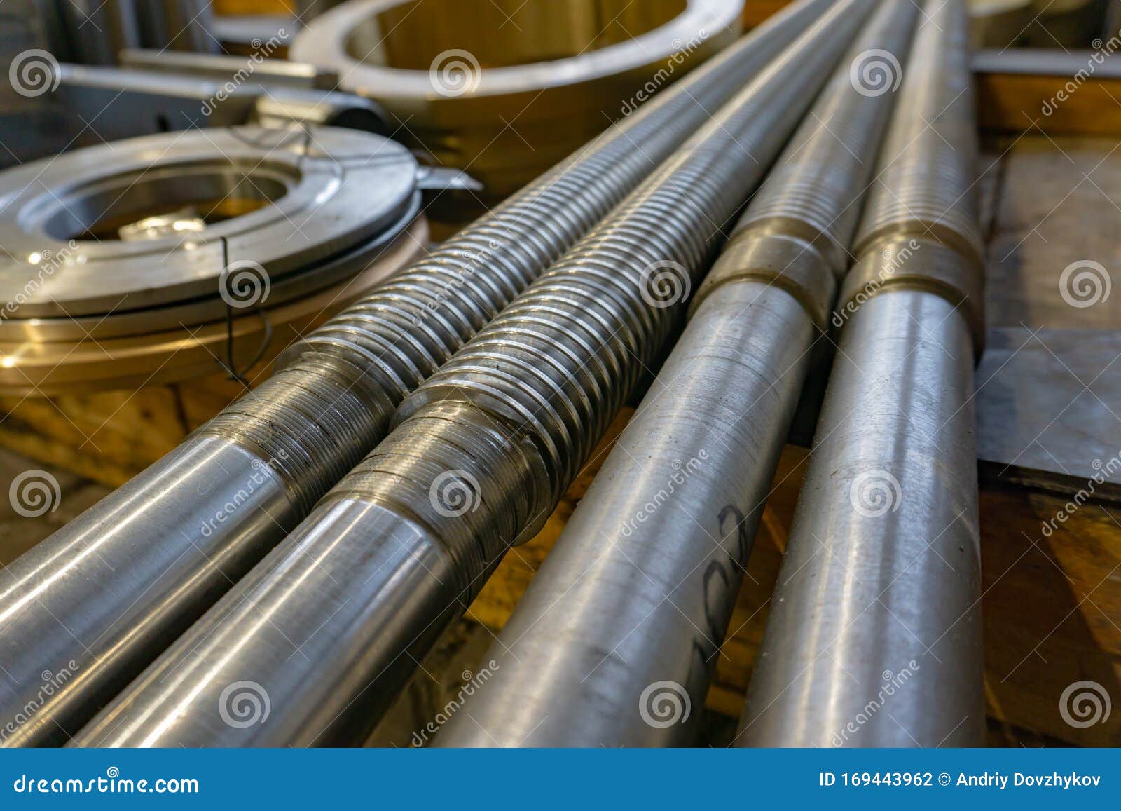 Helical Shaft after Turning and Milling in the Warehouse Stock Photo