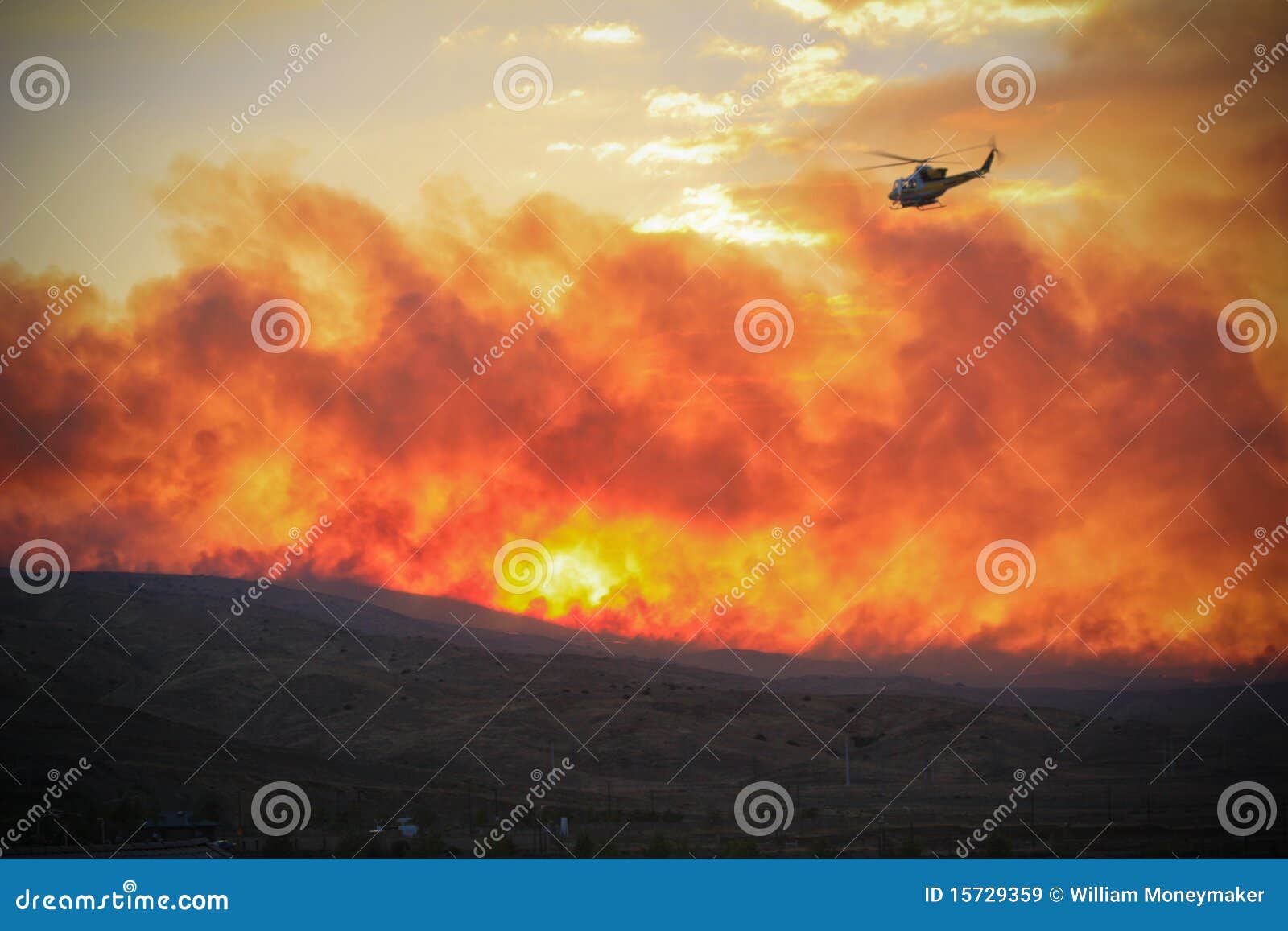 helicopter flying over fire